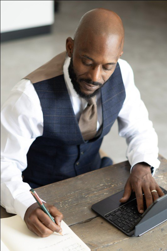 Daneon Francis working at his desk